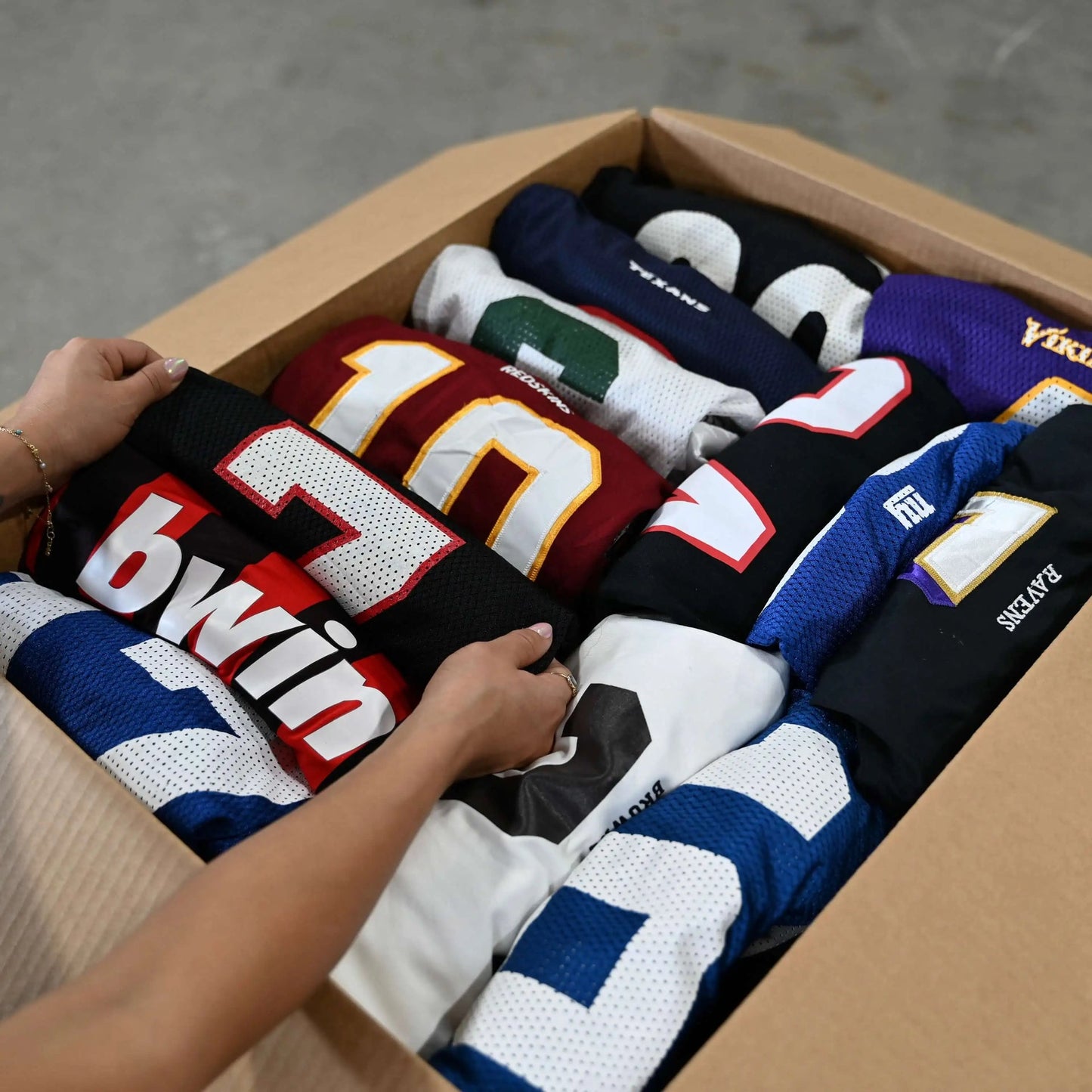 Wholesale Pro and College Sports Jerseys by LB